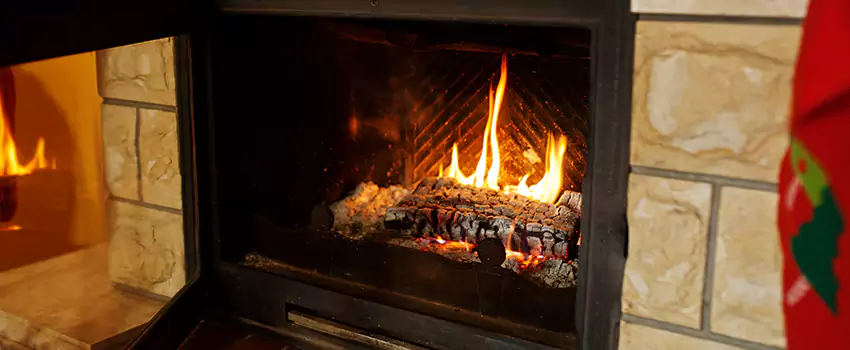 Commercial Prefabricated Fireplace Replacement in Drummondville, Quebec